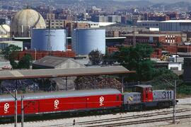 Furgones Paquexpres y locomotora 311 en Can Tunis