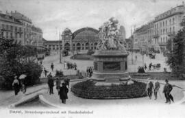 Monumento Strassburger-Denkmal con la estación federal de Basilea.