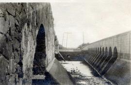 Obras de defensa ejecutadas en el puente de hormigón sobre la ribera de la Nicoba, también denomi...