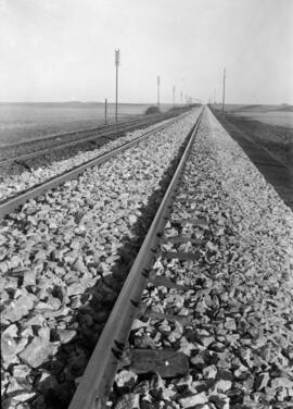 km 89,750 de la línea Palencia a La Coruña, dentro de la provincia de León.