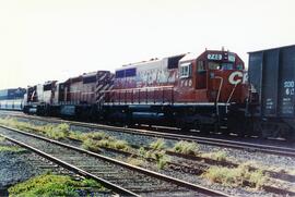 Composición de vagones a su paso por Clinton, Iowa. En cabeza la SOO-6062 (SD60M), la CP-5412 (SD...