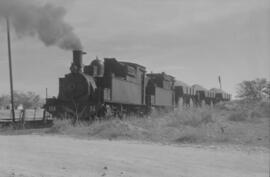 Locomotora de vapor nº14, de rodaje 0-3-0-T, circulando por una vía sin identificar de los Ferroc...