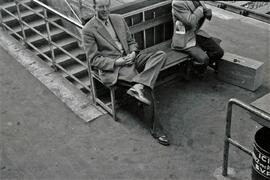 Juan Pedro Baumgartner, amigo de Karl Wyrsch sentado en un banco con una pierna cruzada, posiblem...
