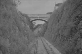Puente de piedra sobre una vía sin identificar de la línea del Ferrocarril de Sant Feliu de Guixo...